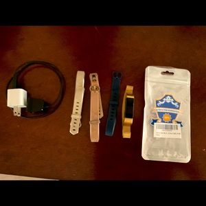 Fitbit thin watch with charger and bands